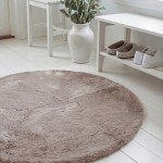 Fluffy beige rund 120 miljo-hel NY